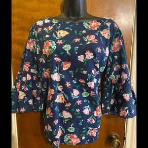 Navy floral blouse with 3 qtr bell ruffle sleeves
